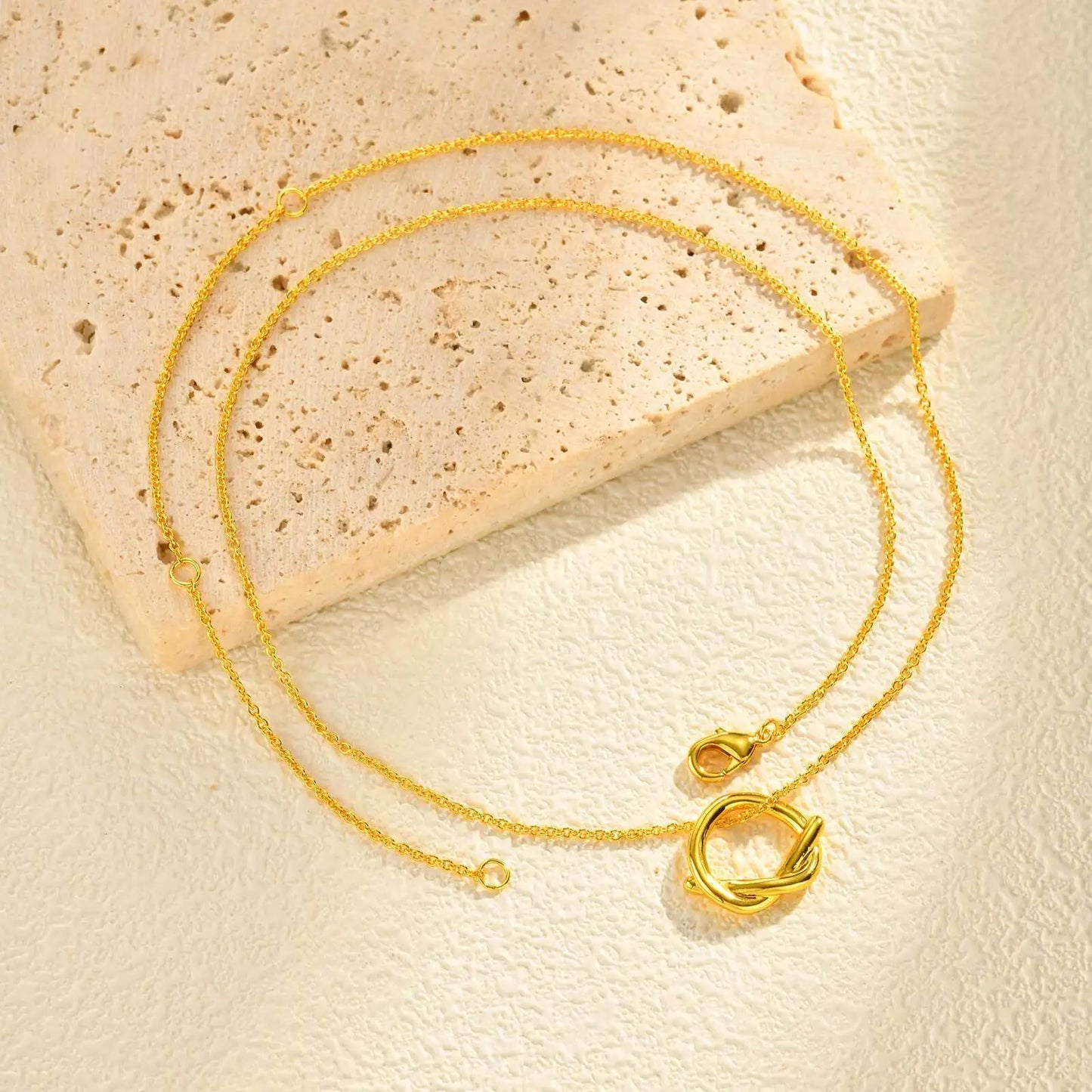 Iris Knot Pendant Necklace